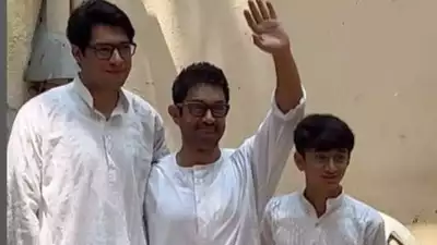 During Eid, Aamir Khan distributes candy and welcomes photographers with his kids Junaid and Azad Rao Khan