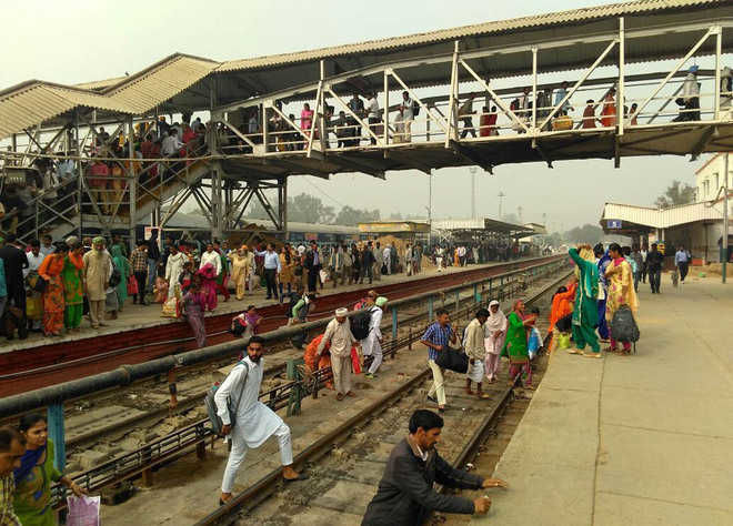 People are still compelled to cross railroad lines since there is no footbridge or underpass